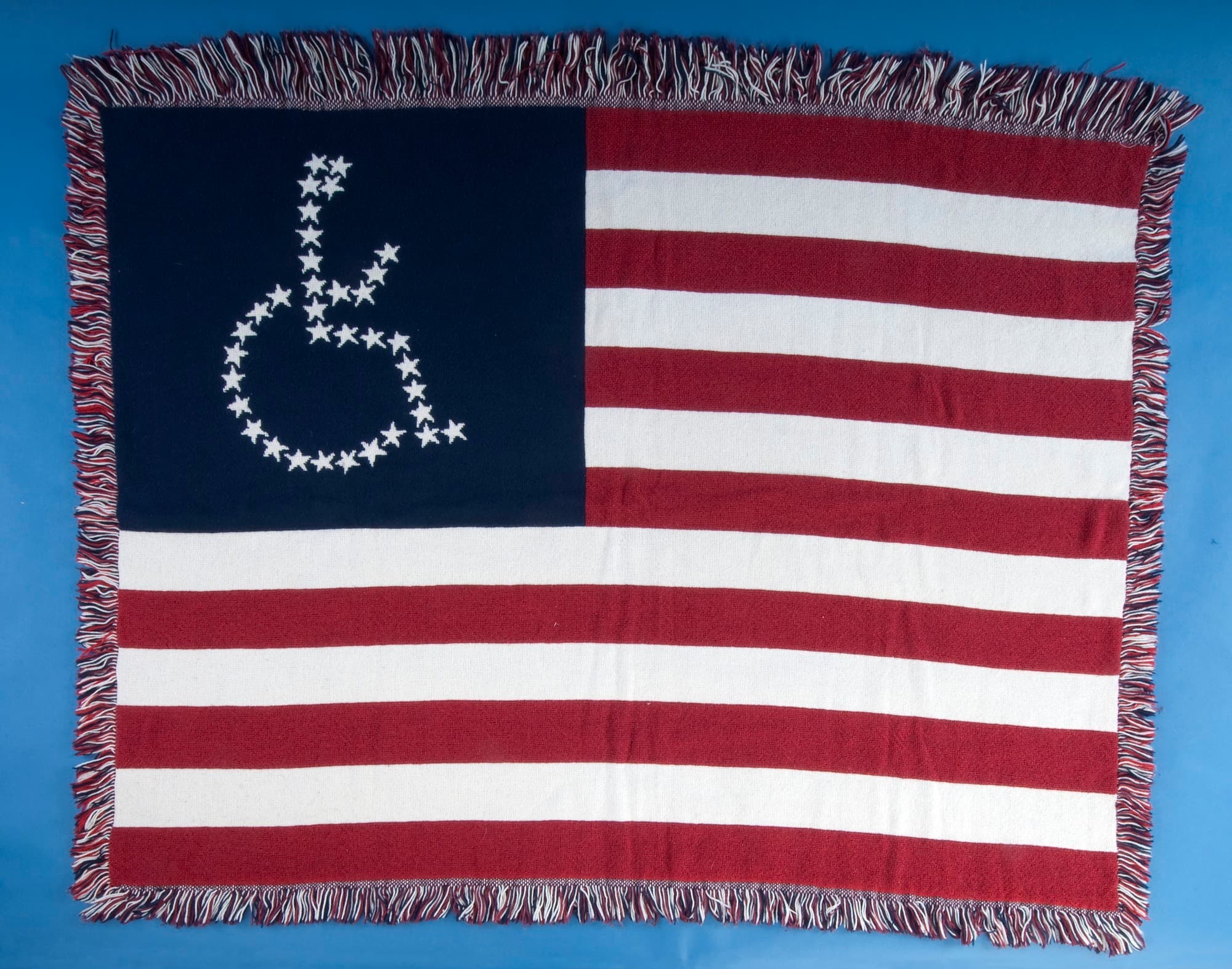 American flag blanket with stars in the shape of a wheelchair symbol